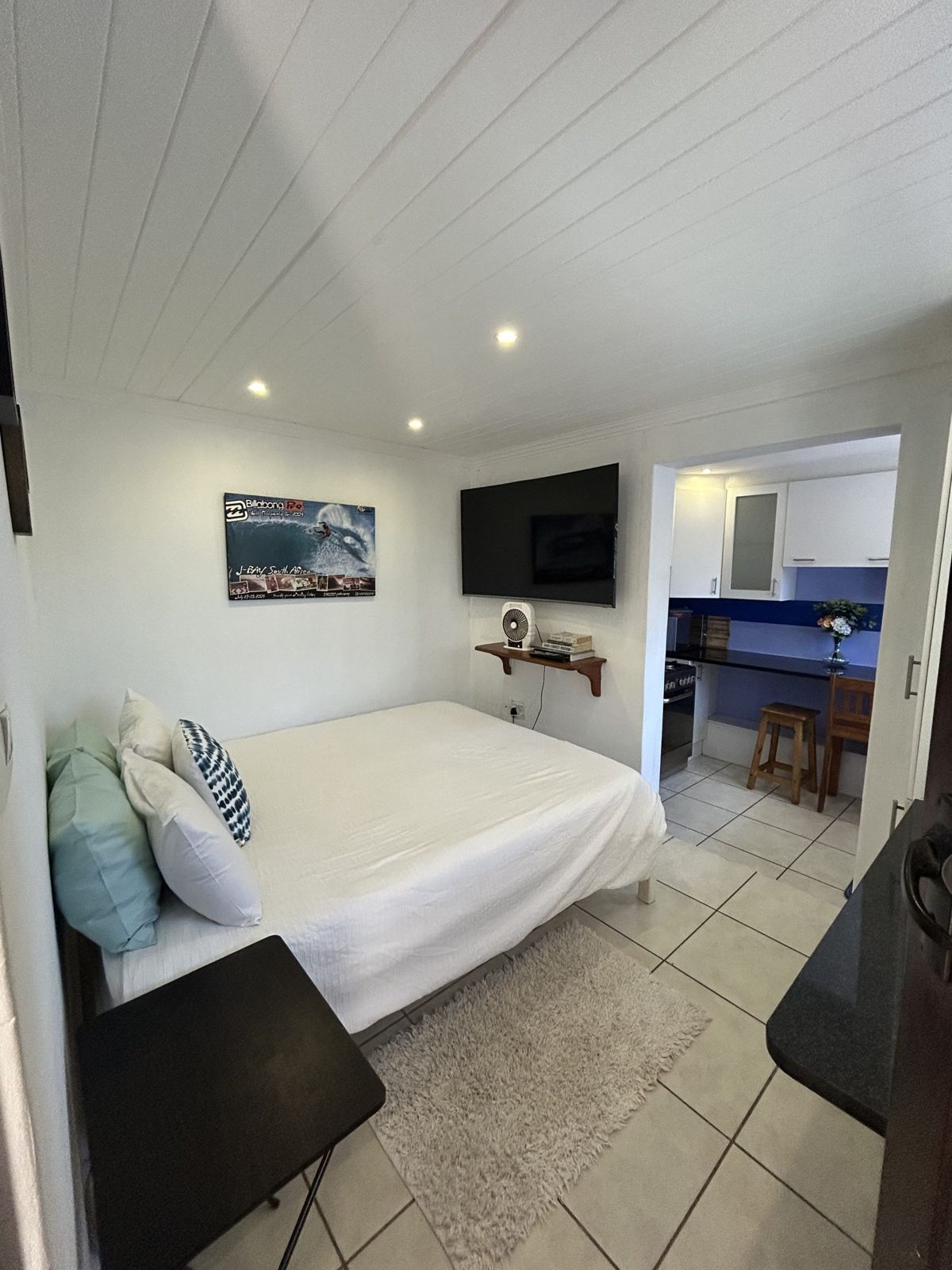 Point double bedroom with sea painting