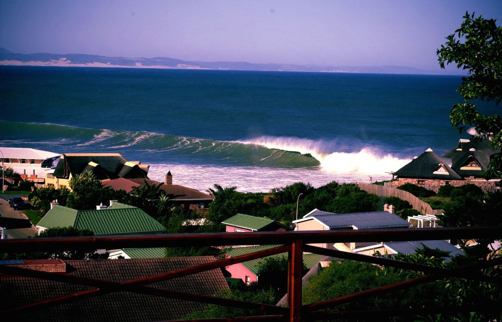 A long right-hander peeling along the Jeffreys Bay point, seen from JBay Surf View